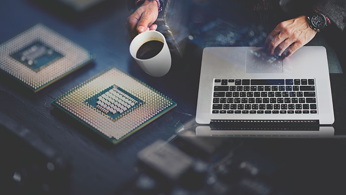 computer-programmer-using-laptop-and-design-website
